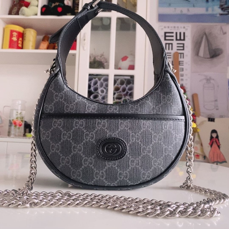 G*u*i top handle bags